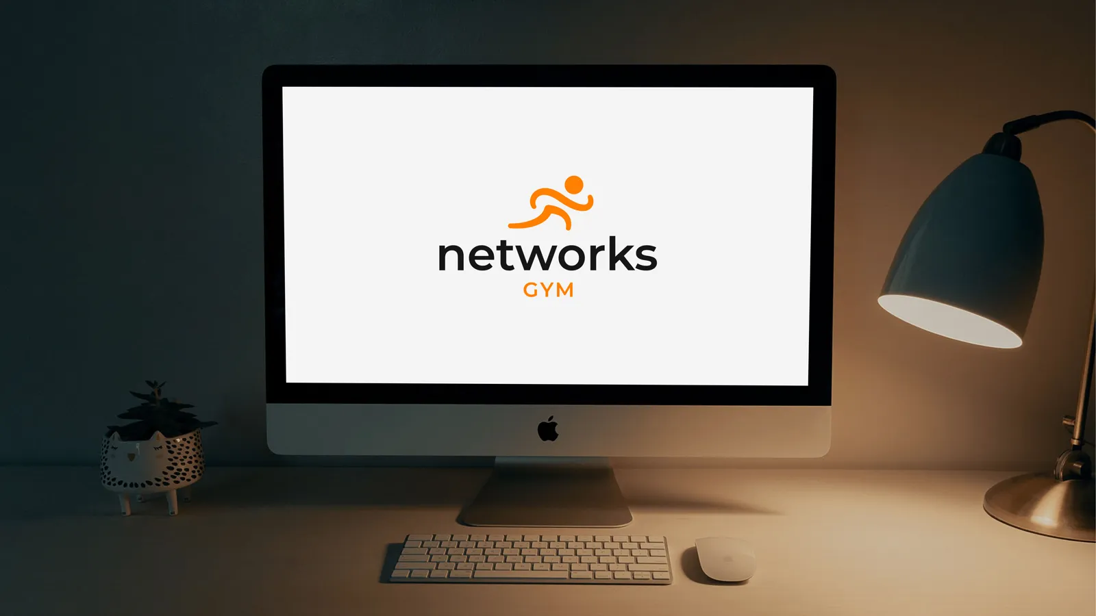 Brandbook Networks Gym : le logo appliqué sur un écran de bureau