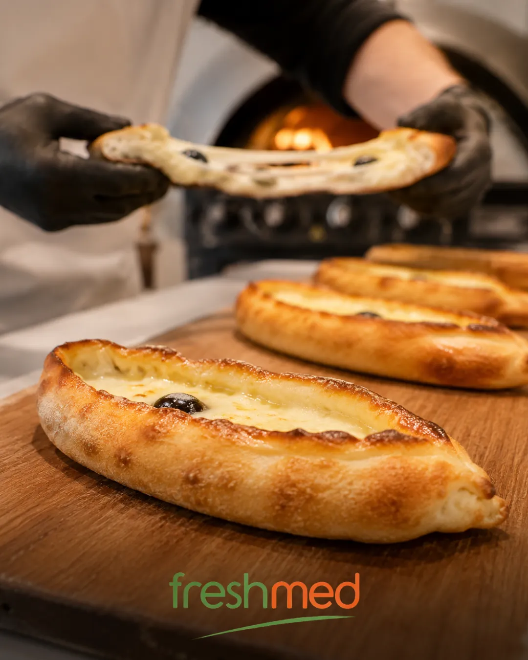 Freshmed : sortie des pides du four à pizza